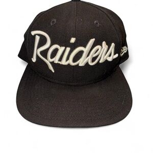 Raiders New Era Snapback Hat in Black with White Script